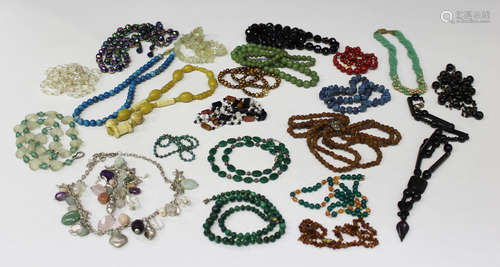 A single row necklace of graduated malachite beads, a costume necklace with a matching bracelet