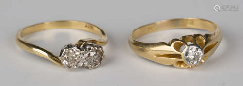 A gold and diamond single stone ring, ring size approx S, and a gold and diamond two stone ring,