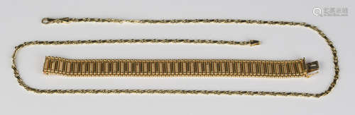 A 14ct gold bracelet in a decorated and plain bar link design with beaded sides, on a snap clasp,