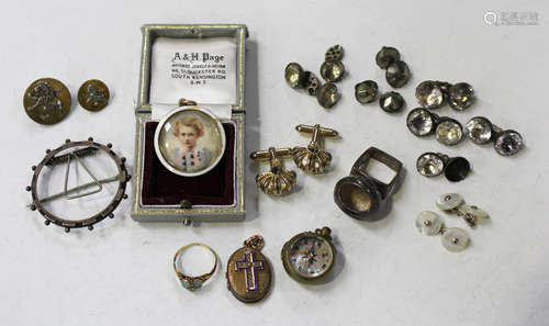 A Victorian water opal ring, a gold and white enamelled circular pendant, glazed with the portrait