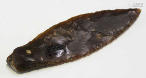 A Danish Neolithic flint dagger blade of leaf form, bearing 'F.S. Clark Denmark Collection' label