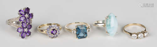 A 9ct gold, amethyst, diamond and pale lilac coloured gemstone cluster ring, a 9ct gold, blue