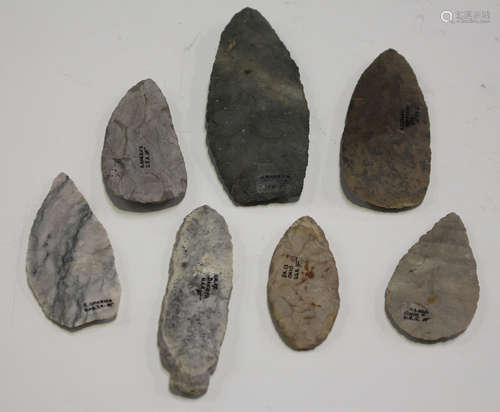 A group of seven Native American flint blades, all with details in black ink, including 'Ohio', '