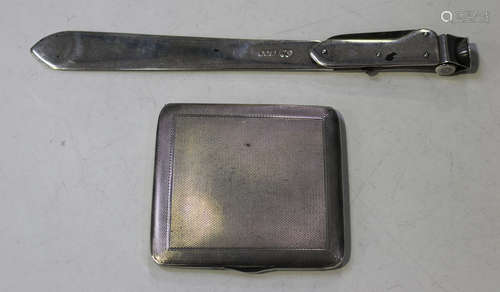 A late Victorian silver mounted page turner, the handle fitted with a folding knife and cigar cutter