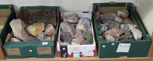 A large selection of various mineral specimens, including calcite, annabergite, quartz, specular