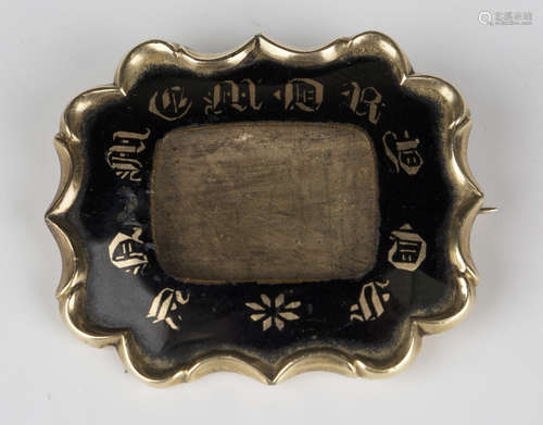 A Victorian black enamelled shaped rectangular mourning brooch, the back inscribed 'James Lomax Obit