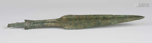 A Luristan bronze spearhead, second millennium BC, of typical expanding form with central rib and