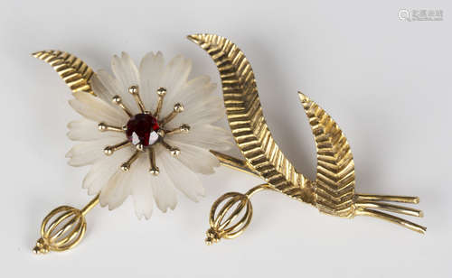 A 9ct gold, garnet and frosted rock crystal brooch, designed as a floral spray, London 1957, width