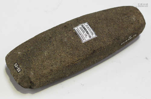 A Scandinavian Neolithic pecked and part-polished stone axe head of tapering form, bearing 'F.S.