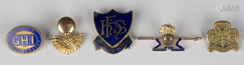 A gold and enamelled military brooch badge, designed as the badge of 'The Lancashire Fusiliers',