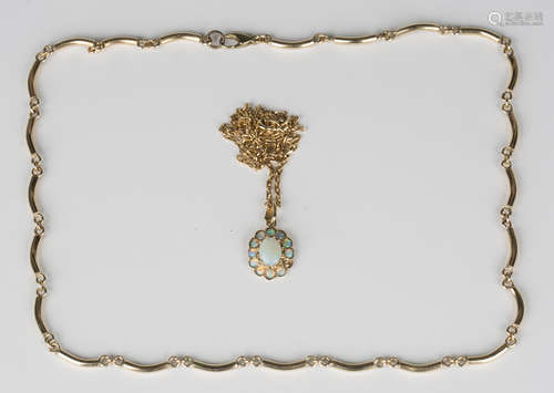 A 9ct gold and opal cluster pendant, length 2.5cm (one opal lacking), with a 9ct gold faceted oval