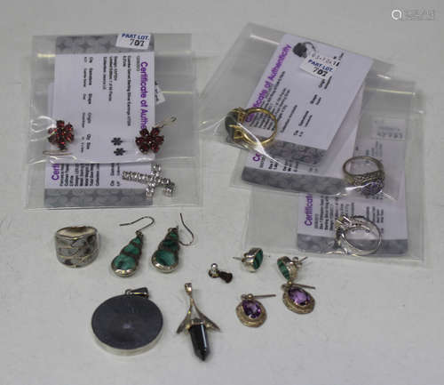 A small group of mostly silver and gem set jewellery, comprising four rings, three pendants and four