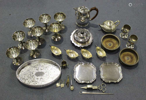 A group of plated items, including a set of eight goblets, a bachelor's teapot by Elkington & Co,