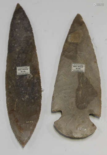 An American flint spear head of typical long tapering form with notched fixing, bearing 'F.S.