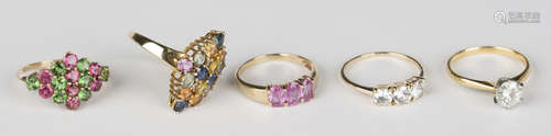 A 9ct gold and colourless zircon three stone ring, a 9ct gold and vari-coloured gemstone and diamond