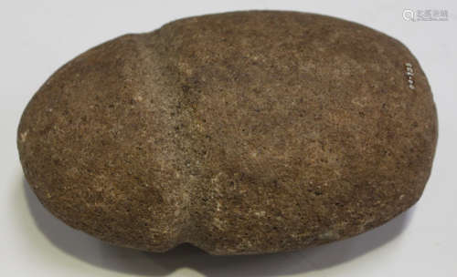 A North American grooved butt stone hammer head, detailed in white ink 'U.S.A. 39' and bearing