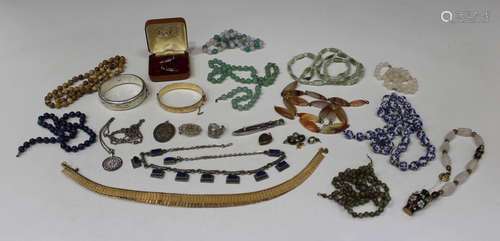 A collection of costume jewellery, including bead and other necklaces, brooches, a pair of silver