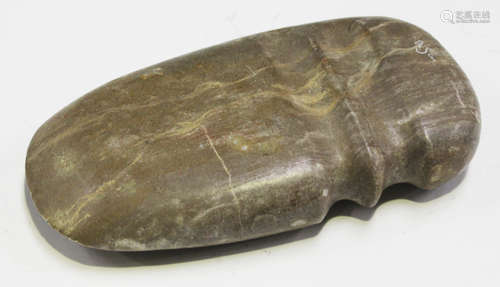 A large North American polished stone grooved butt axe head, bearing collection details and