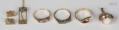 A Victorian gold, ruby and diamond five stone ring, Birmingham 1890, a 9ct gold and emerald five