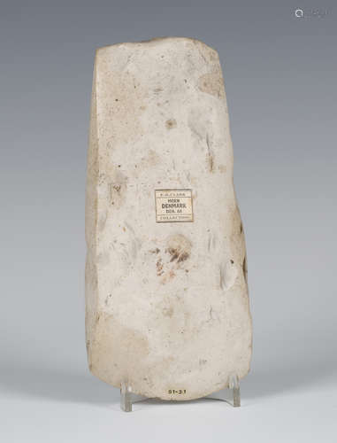 A Danish Stone Age polished flint axe head, bearing 'F.S. Clark Moen Denmark Collection' label and