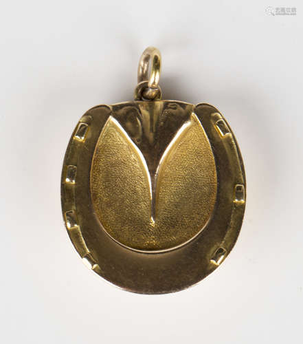 A Victorian gold cased pendant locket, designed as a horse's hoof with horseshoe front, length 3cm.