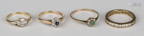 A gold and diamond five stone cluster ring with pierced shoulders, a 9ct gold, diamond and