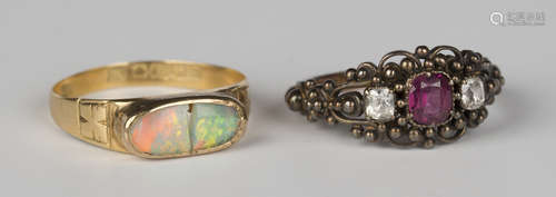 An 18ct gold and opal ring, ring size approx R (opal cracked), and a Victorian garnet and colourless