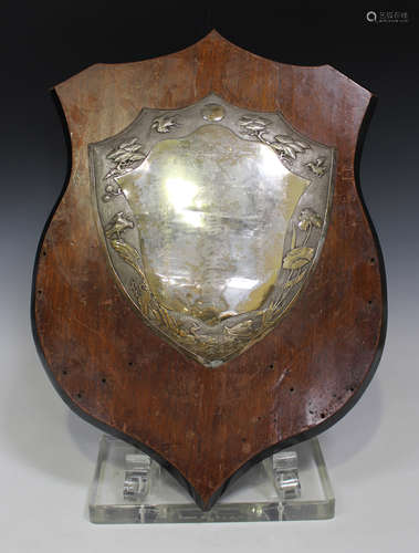 An early 20th century Chinese silver presentation shield, the centre engraved with lines of text