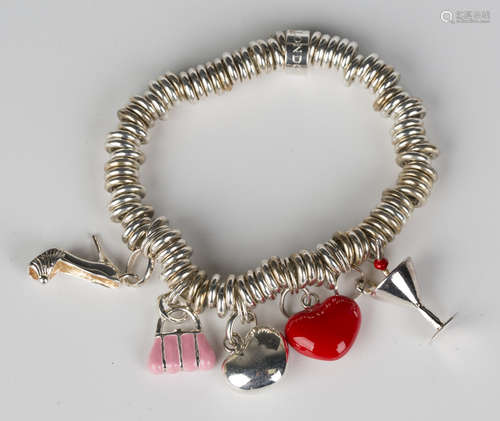 A Links London charm bracelet of circular link form, fitted with five various pendants and charms,