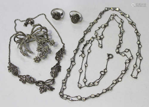 A group of mostly silver jewellery, comprising a marcasite necklace, two marcasite rings, a