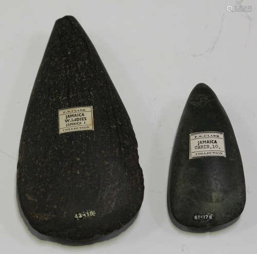 A Jamaican polished green stone axe head, bearing 'F.S. Clark Jamaica Collection' label and