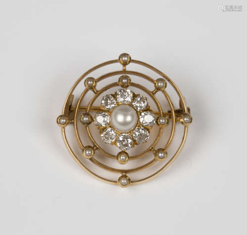 A gold, diamond and cultured pearl brooch of circular openwork form, mounted with the principal