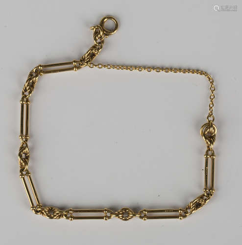 A 9ct gold bar and knot link bracelet on a boltring clasp, detailed '9ct', fitted with a safety