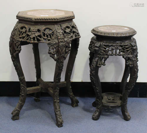 A Chinese carved hardwood stand, late 19th/early 20th century, the octagonal top with beaded