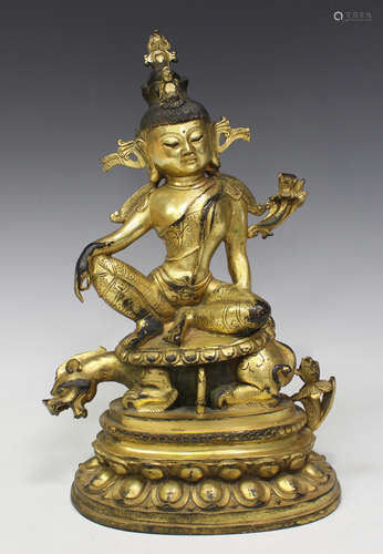 A Sino-Tibetan gilt bronze figure of a bodhisattva, probably 20th century, modelled seated on the