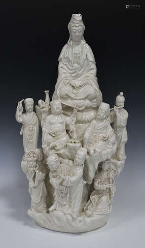 A group of four Chinese blanc-de-Chine porcelain figures, 20th century/modern, one modelled as