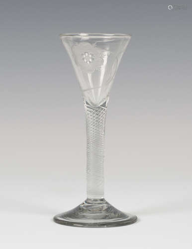 A Jacobite wine glass, mid-18th century, the drawn trumpet bowl engraved with an open rose and a bud