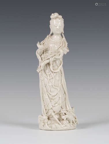 A Chinese blanc-de-Chine porcelain figure of Guanyin, Qing dynasty, with attractively detailed