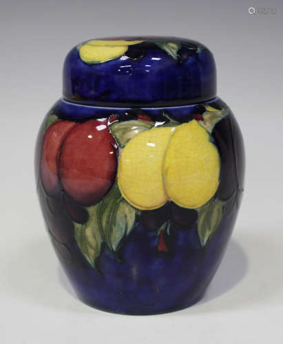 A Moorcroft pottery ginger jar and cover, circa 1920-25, decorated with Wisteria design against a