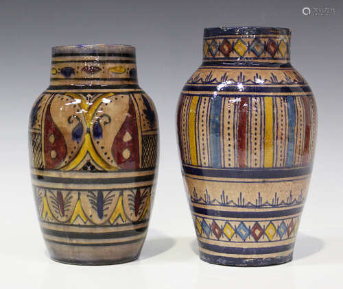 Two Islamic pottery vases, possibly Moroccan, early 20th century, each of high shouldered form