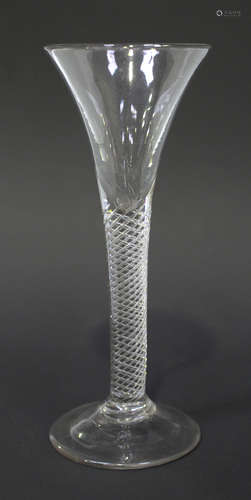 An airtwist stem wine glass, circa 1750, the drawn trumpet bowl raised on a plain stem with multi