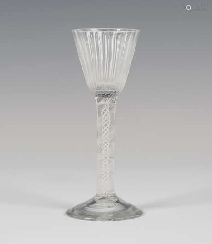 A rare ribbed bowl wine glass, circa 1770, the rounded funnel bowl on a plain stem with an eleven-