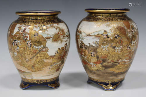 A pair of Japanese Satsuma earthenware vases, Meiji period, each ovoid body painted and gilt with