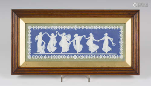 A Wedgwood three colour jasperware rectangular plaque, 19th century, ornamented in white with the