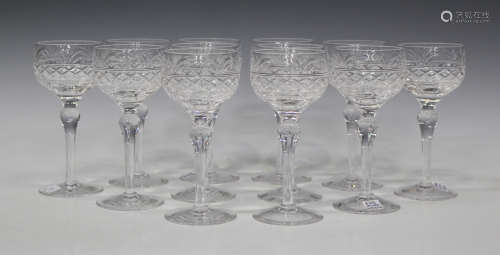A set of twelve Stuart Crystal hock glasses, each cut bowl on a slender baluster stem and circular