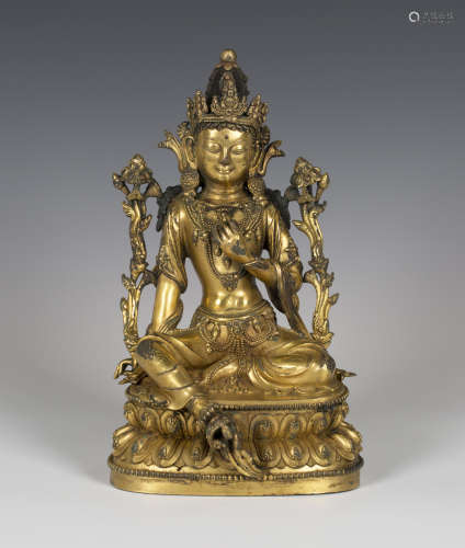 A Sino-Tibetan gilt bronze figure of Tara, probably 20th century, modelled seated in lalitisana,