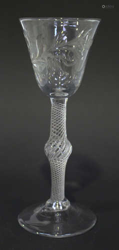 A 'Jacobite type' airtwist stem wine glass, mid-18th century, the rounded funnel bowl engraved and