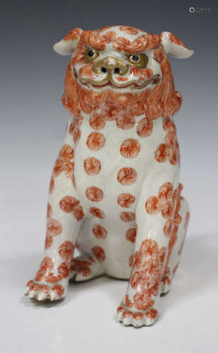 A Japanese Kutani porcelain figure of a Karashishi, Meiji period, the lion dog modelled in a