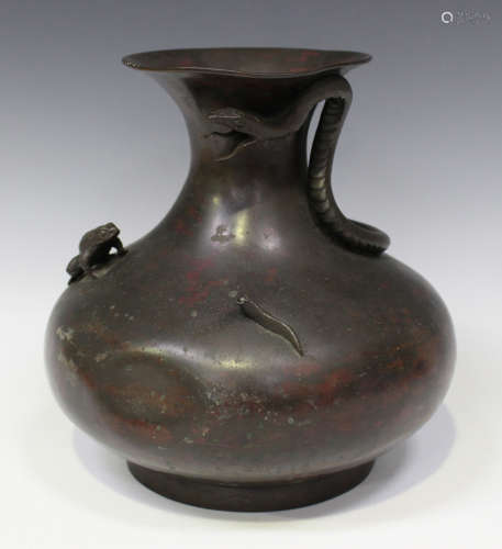 A Japanese brown patinated bronze vase, Meiji period, of low baluster form, the flared neck