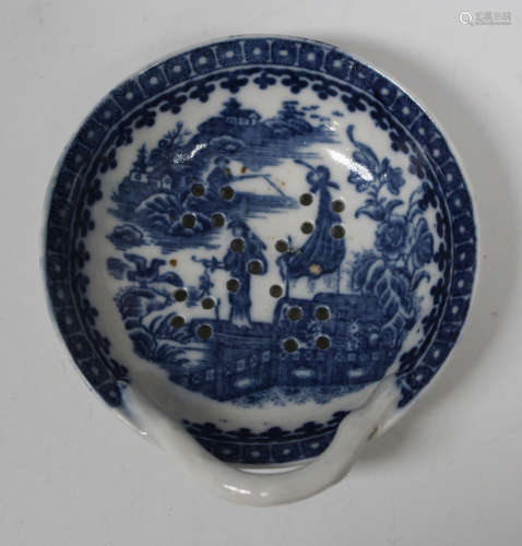 A Caughley porcelain Fisherman and Cormorant pattern egg strainer, circa 1779-99, the pierced